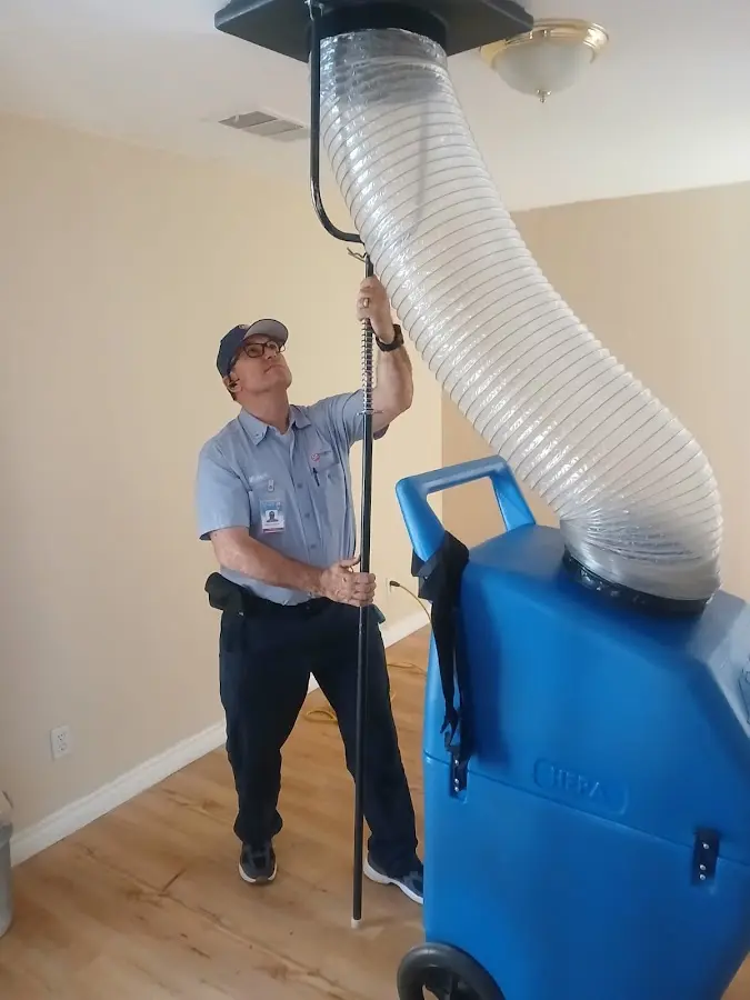 HVAC Installation technician using HEPA equipment in Genoa